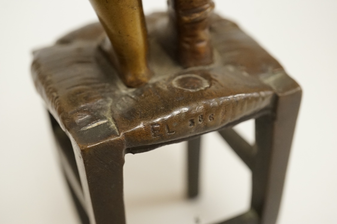 Juan Clara, a figure of a girl on a stool, 21.5cm high